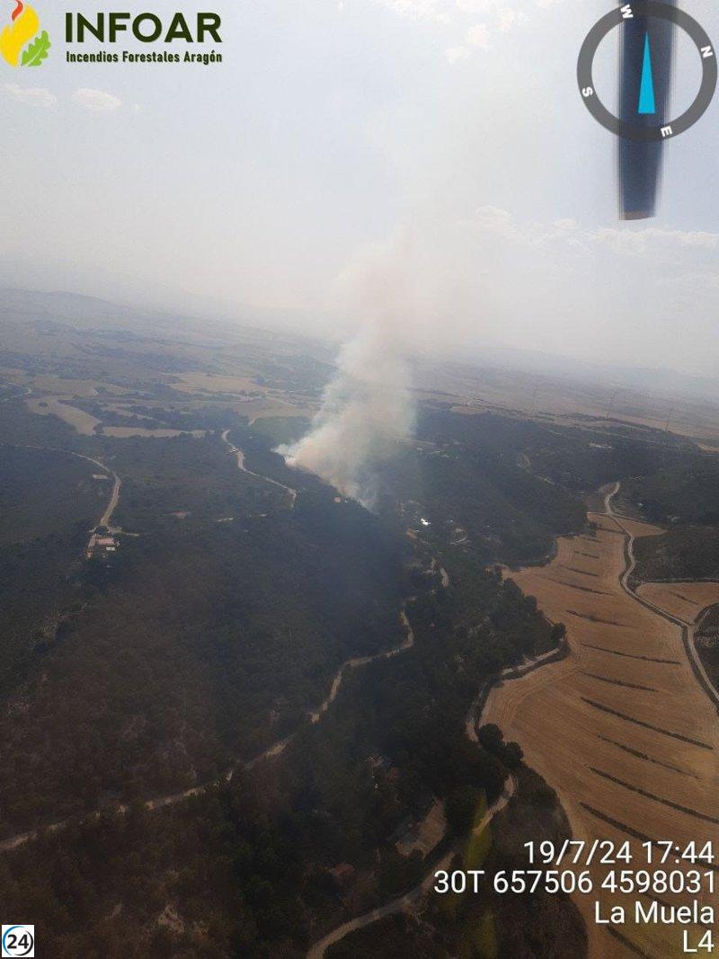 Incendio en La Muela: Evacuación de vecinos en urbanización Pinares.