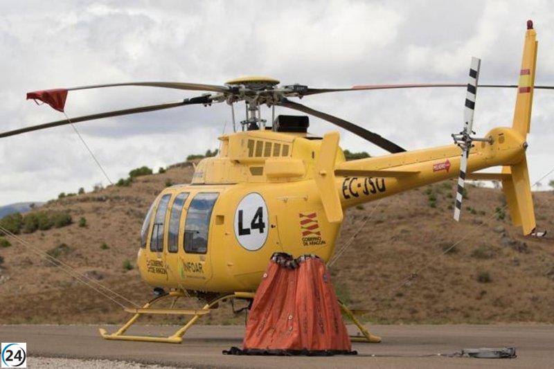 Los helicópteros de INFOAR inician su salida tras la fase crítica de operación.
