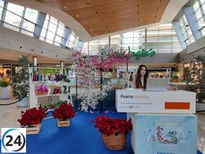 Puerto Venecia dona libros al Hospital Miguel Servet por el Día de San Jorge.